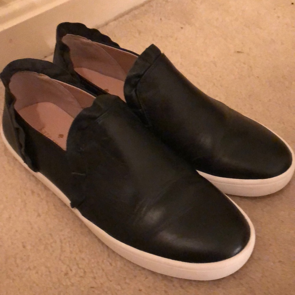 Kate Spade New York black loafers with ruffle.